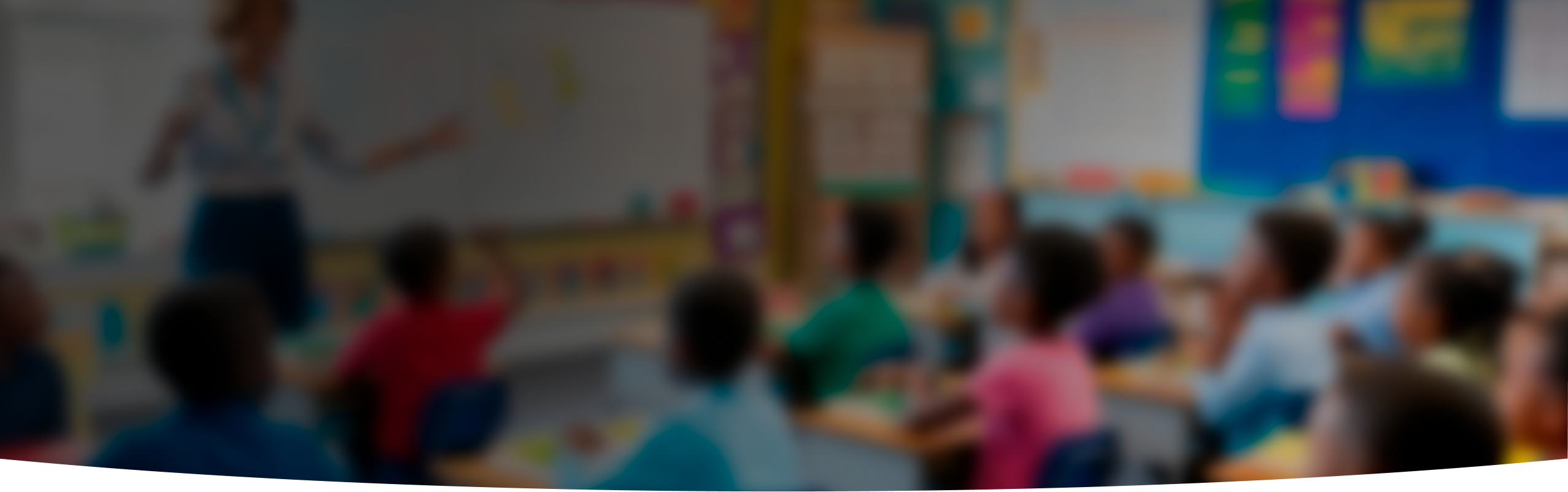 Classroom with teacher speaking in front of children